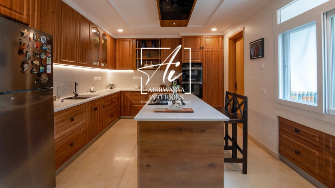 Wooden Finish Modular Kitchen In 4 BHK Mantri Espana Apartment