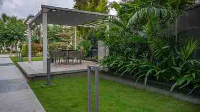 The Modern Canopy Backyard in Jayabheri Villa