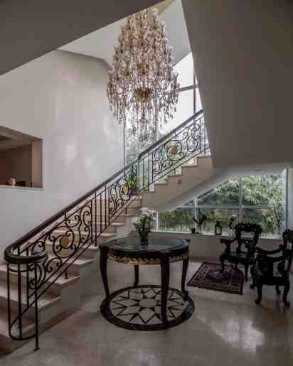Staircase in The White Habitat Farmhouse
