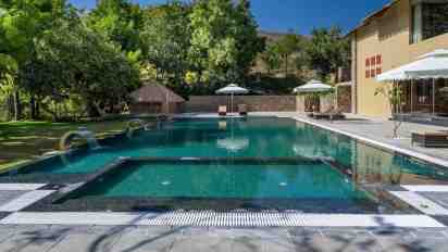 Swimming Pool with Sun Loungers in Amaara Tree of Life Resort