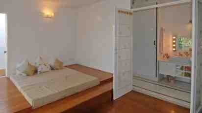 Bedroom in White and Wood Villa