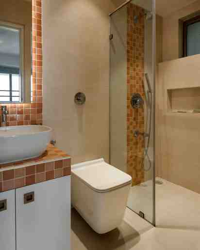 Bathroom In All white Mumbai Apartment