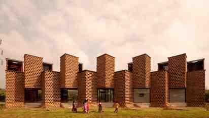 Restaurant Exterior with Geometric Brick Facade Multiple Vertical Towers of Restaurant Exterior