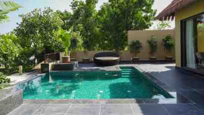 Swimming Pool with Floating Water Lights in Amaara Tree of Life Resort