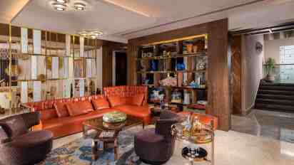 Home Bar with Built-In Display Shelves in Chattarpur Farmhouse