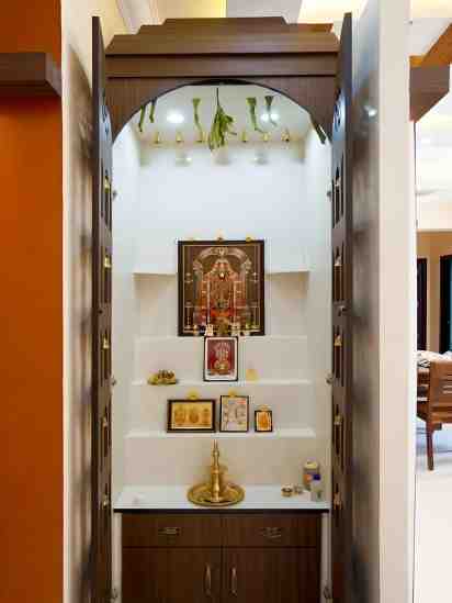 Pooja Unit Designed by Home Trends Interiors & Carpenters