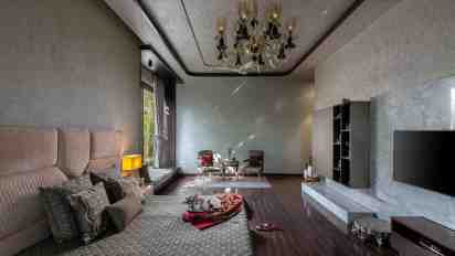 Bedroom with Dark Wood Accents in Chattarpur Farmhouse