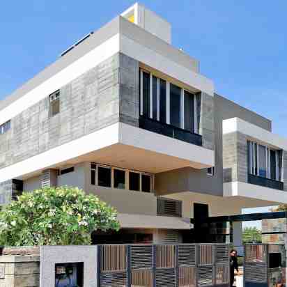 House Exterior of Twin Boxes Residence