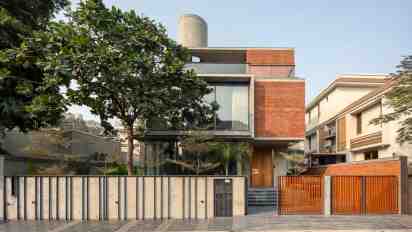 House Exterior with Brick Cladding of The Box House