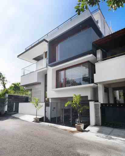 House Exterior with Glass Windows of Cube House