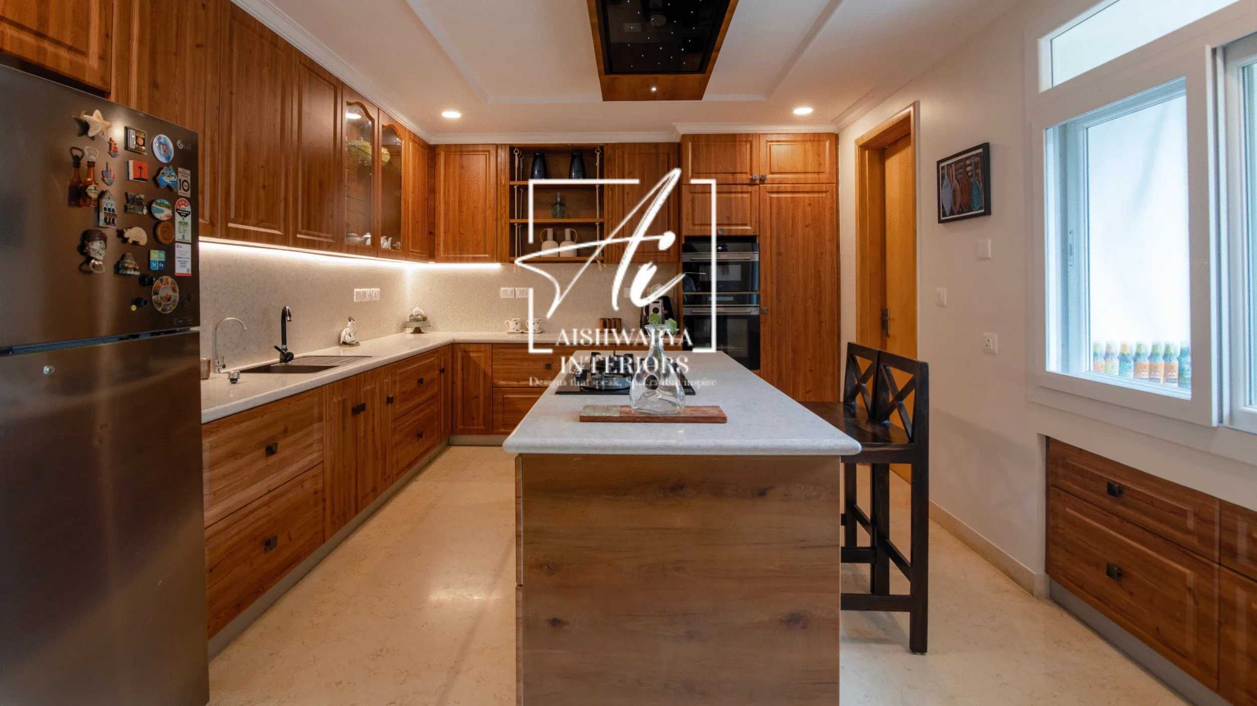 Wooden Finish Modular Kitchen In 4 BHK Mantri Espana Apartment